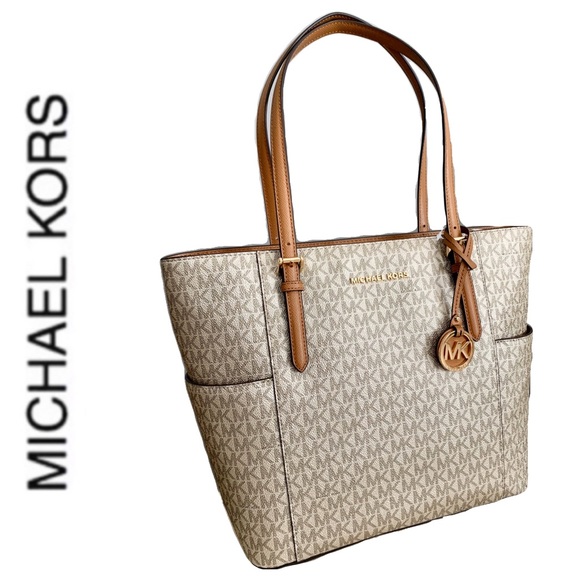 Michael Kors Handbags - NWT authentic MK signature monogram tote pale gold